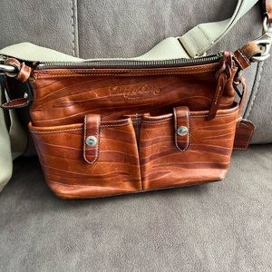 Dooney & Bourke crossbody purse in tiger print.